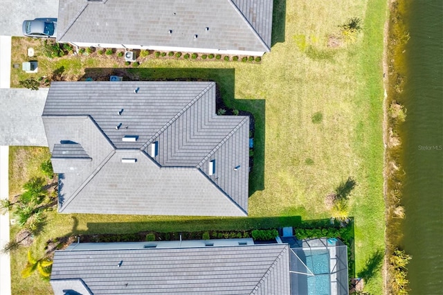 bird's eye view with a water view