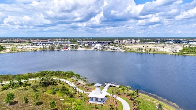 birds eye view of property featuring a water view