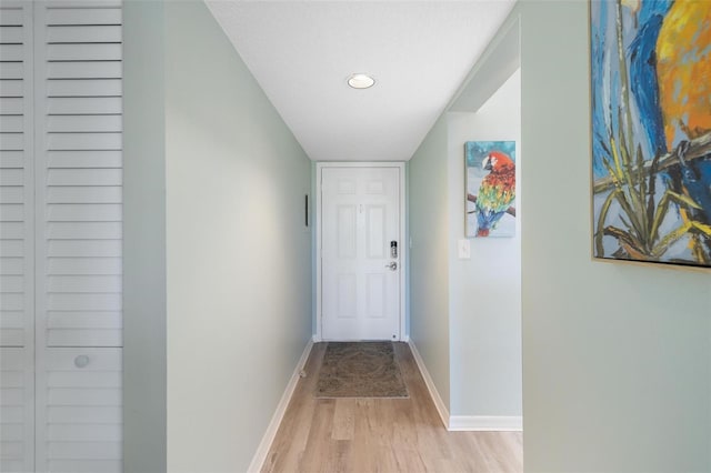 doorway to outside featuring light hardwood / wood-style floors