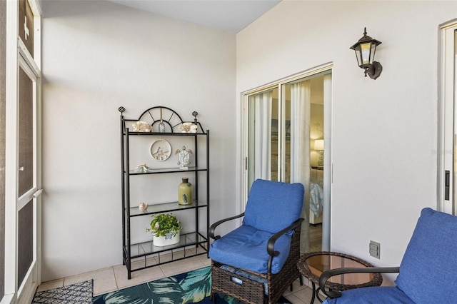 living area with tile patterned flooring