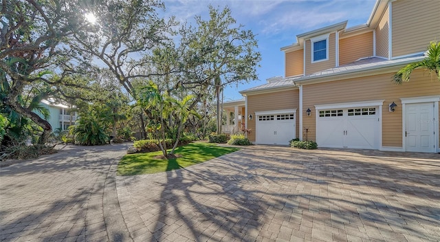 view of property exterior with a garage