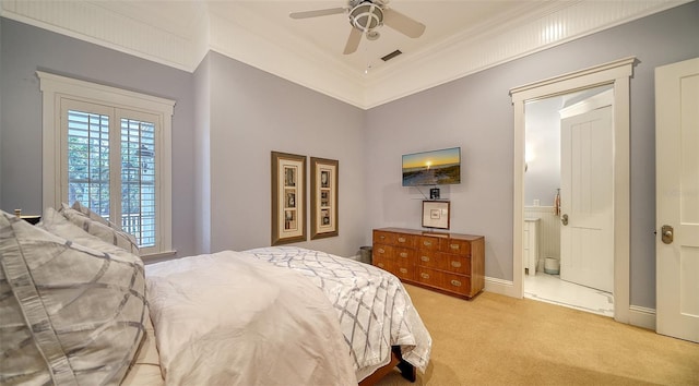 carpeted bedroom featuring ceiling fan and ornamental molding