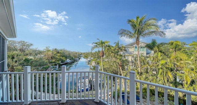 balcony featuring a water view