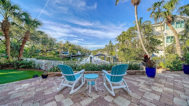 view of patio / terrace featuring a water view