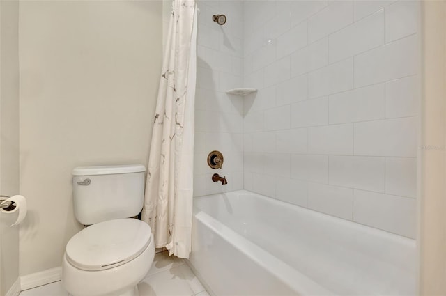 bathroom featuring toilet and shower / bath combination with curtain