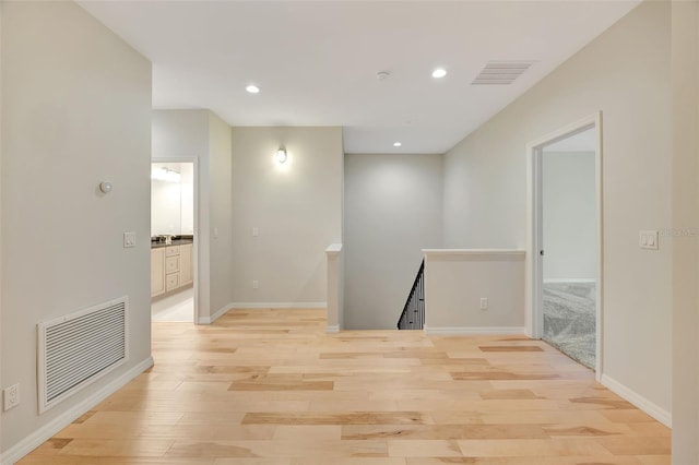 hallway featuring light hardwood / wood-style floors