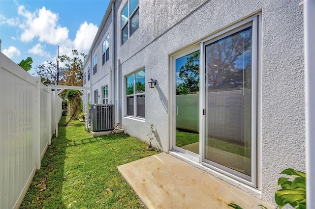 exterior space featuring a patio and central AC unit