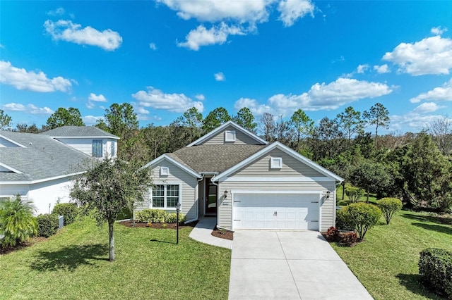 view of front of home with a front lawn and a garage