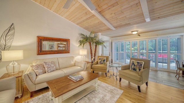 living room featuring wood ceiling, beamed ceiling, high vaulted ceiling, and light wood-type flooring