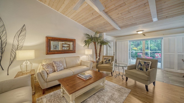 living room with light hardwood / wood-style floors, high vaulted ceiling, wooden ceiling, and beam ceiling