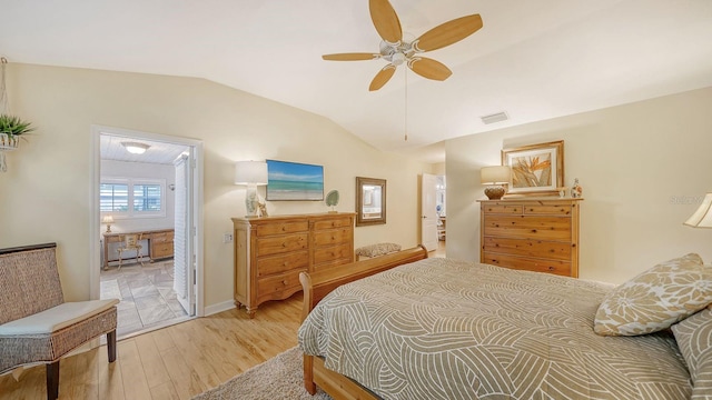 bedroom featuring light hardwood / wood-style floors, lofted ceiling, and ceiling fan