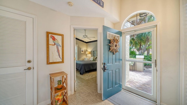 entryway with ceiling fan