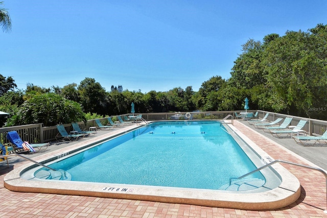 view of pool with a patio area