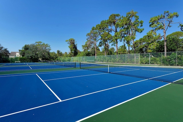 view of tennis court with basketball court