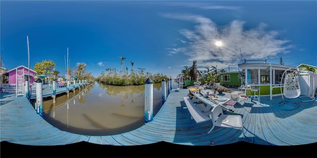 dock area with a water view