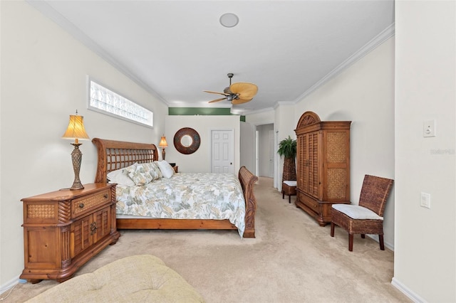 bedroom with light colored carpet, ceiling fan, and ornamental molding