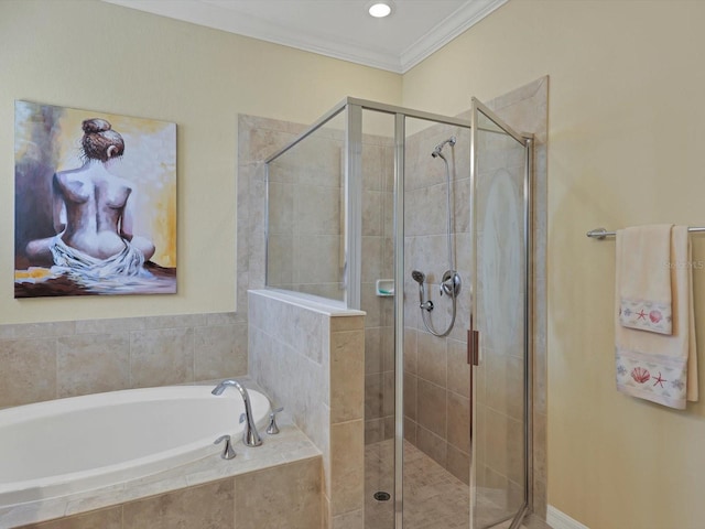 bathroom with crown molding and independent shower and bath