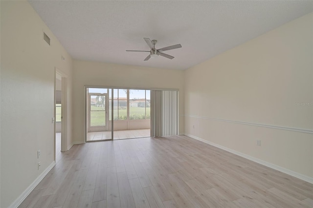 4210 Caddie Dr E Unit 102, Bradenton, FL 34203 - spare room featuring a ceiling fan, baseboards, and light wood finished floors