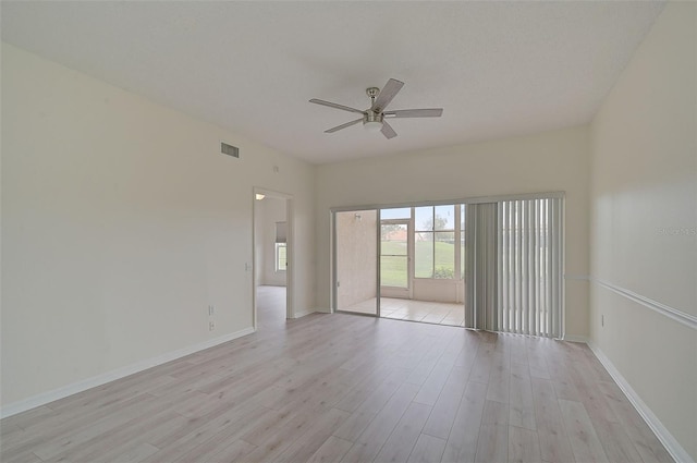4210 Caddie Dr E Unit 102, Bradenton, FL 34203 - empty room with light wood finished floors, visible vents, baseboards, and ceiling fan