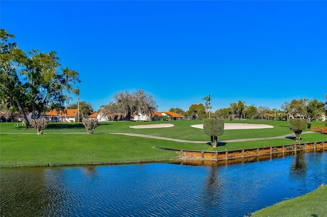4210 Caddie Dr E Unit 102, Bradenton, FL 34203 - view of home's community featuring view of golf course, a water view, and a lawn