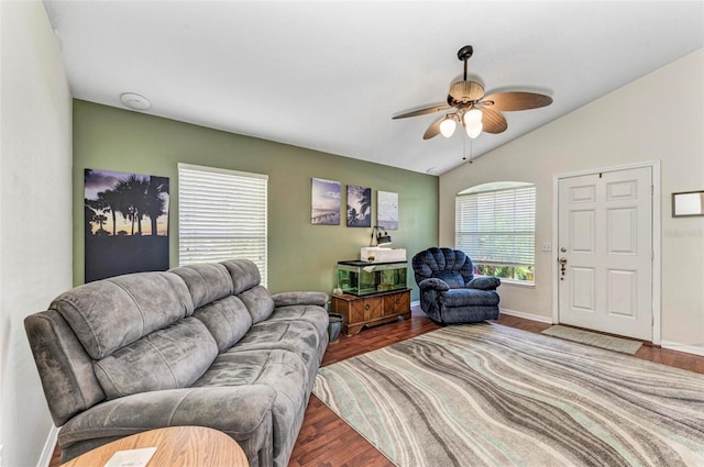 living room featuring ceiling fan, hardwood / wood-style flooring, and lofted ceiling