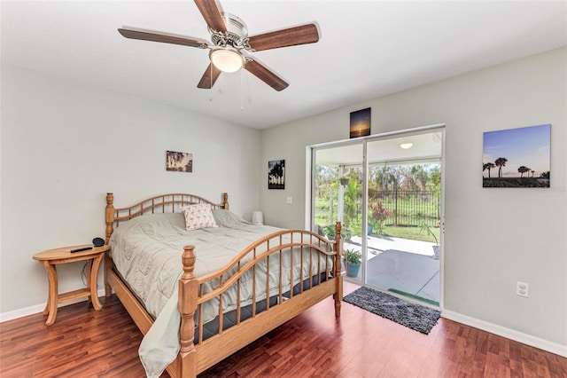 bedroom with dark hardwood / wood-style floors, access to exterior, and ceiling fan