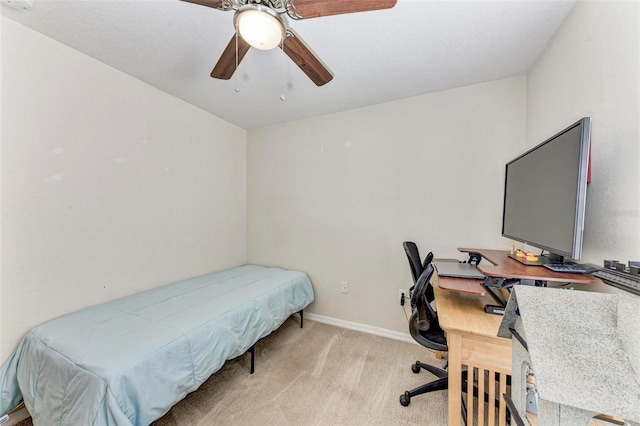 bedroom with light colored carpet and ceiling fan