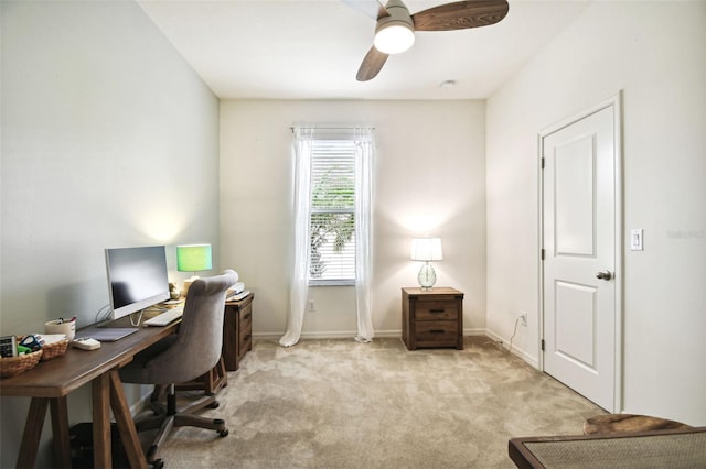 office featuring ceiling fan and light colored carpet