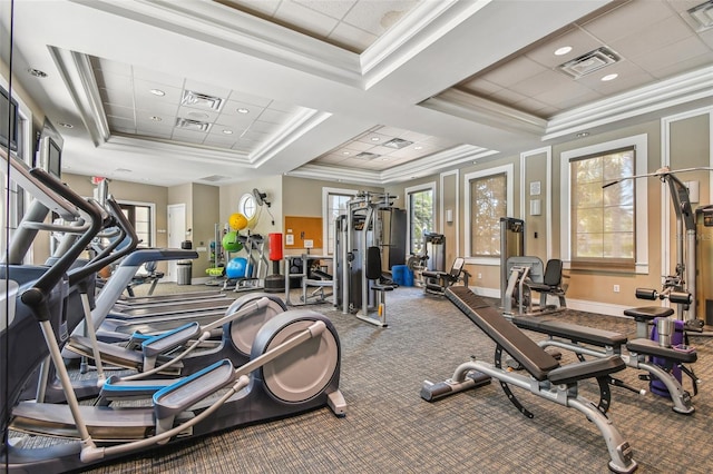 gym featuring ornamental molding, coffered ceiling, and carpet floors