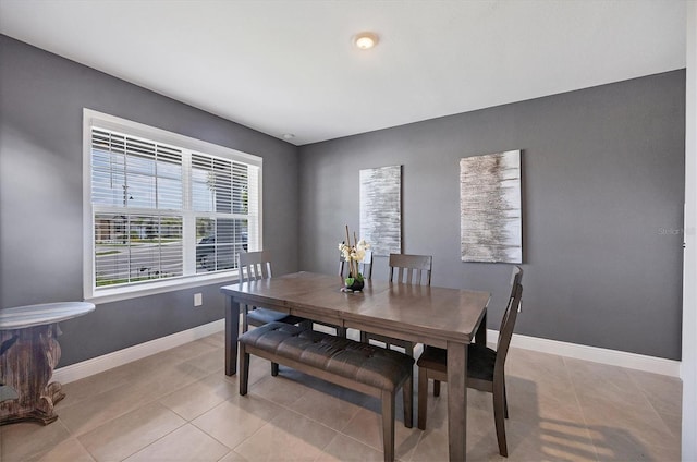 dining room with light tile patterned floors