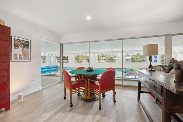 dining room featuring light hardwood / wood-style floors