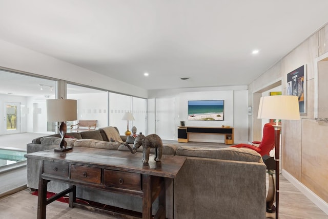 living room with light hardwood / wood-style floors