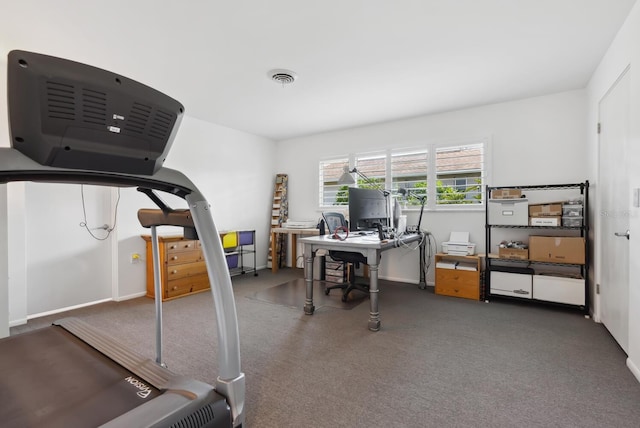 home office with carpet flooring