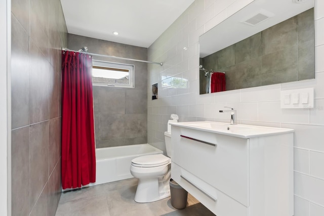 full bathroom with toilet, tile walls, shower / bath combo with shower curtain, vanity, and decorative backsplash