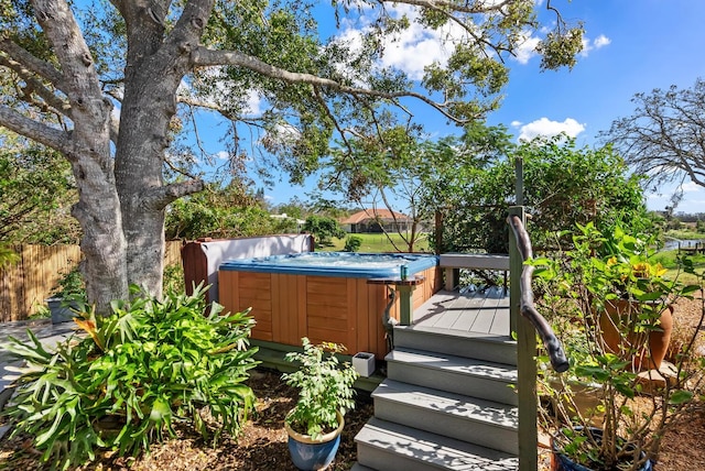 deck with a hot tub