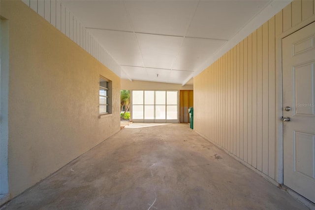 hall with concrete floors