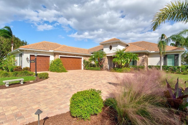 mediterranean / spanish-style home featuring a garage