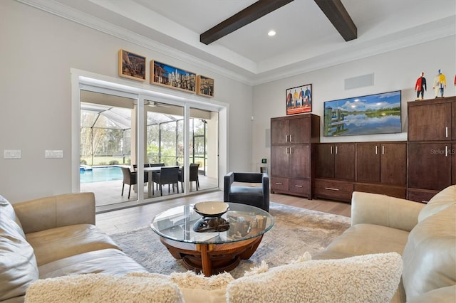 living room featuring beamed ceiling, light wood-type flooring, and crown molding