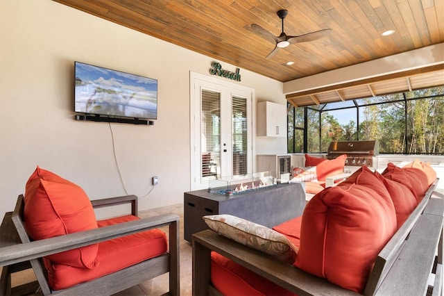 interior space with ceiling fan, french doors, and wooden ceiling