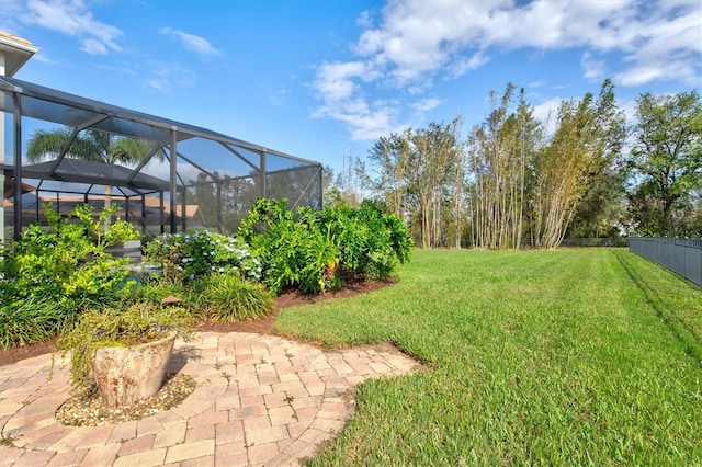 view of yard featuring a lanai