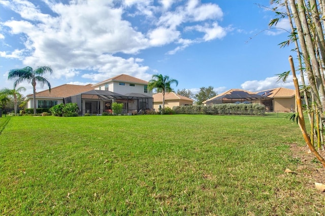 view of yard featuring a lanai