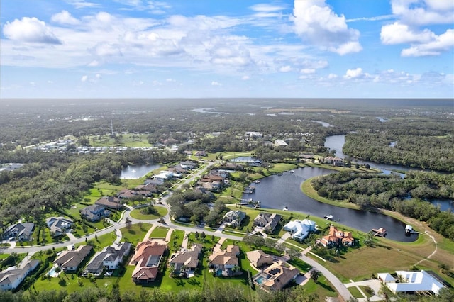 drone / aerial view with a water view