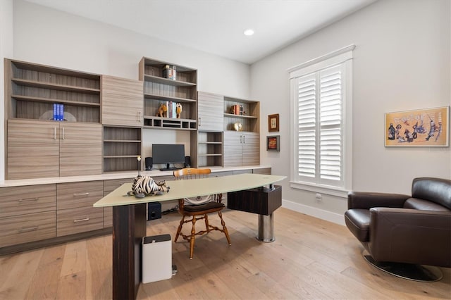 home office featuring light wood-type flooring, baseboards, and recessed lighting