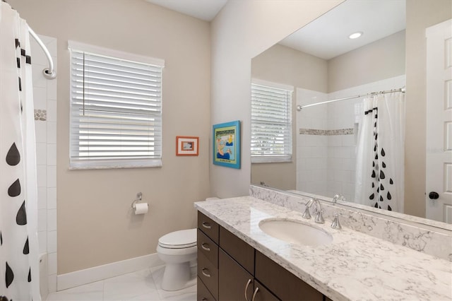 full bathroom with curtained shower, vanity, toilet, and baseboards