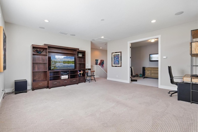 living room with recessed lighting, light colored carpet, and baseboards