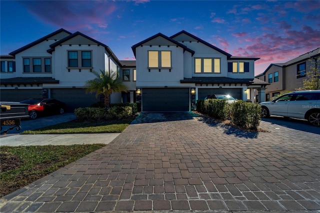 front of property with a garage