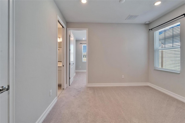 view of carpeted spare room