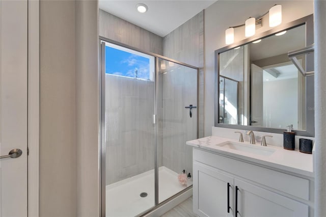 bathroom featuring vanity and walk in shower