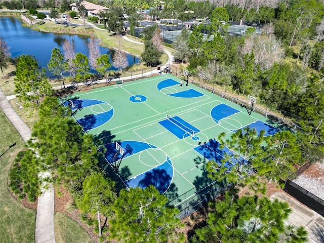 view of sport court featuring a water view