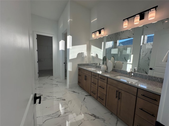 bathroom featuring vanity and tiled shower